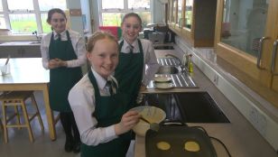  Year 8's Learn to make pancakes
